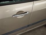 a car with a broken door handle and a broken window