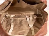 a brown bag that is sitting on a table