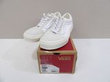 vans old skooler sneakers in a box on a white surface
