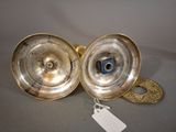 a pair of silver plated candlesticks