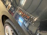a close up of a car with a sticker on it