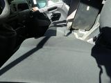 a view of the inside of a vehicle from the driver ' s seat