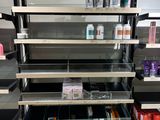 many shelves of cosmetics products in the store
