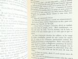 an open book with a picture of a bird on it