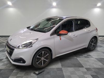 the white car is parked on a checkered floor in the garage