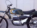 a motorcycle that is parked in front of a wall