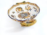 an image of a bowl with a handle on a stand