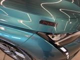 a close up of a car that has a sticker on it