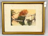 an image of a picture of a painting of a river in a gold frame