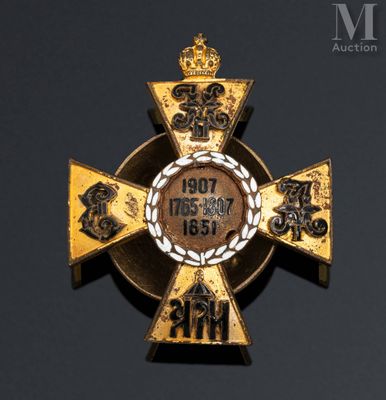 an image of a gold cross with a crown on top of it