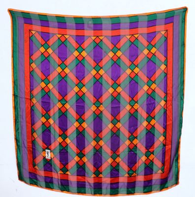 a close up of a purple, green, and orange plaid scarf
