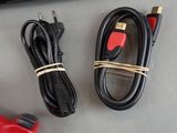 two cables that are connected to a laptop computer