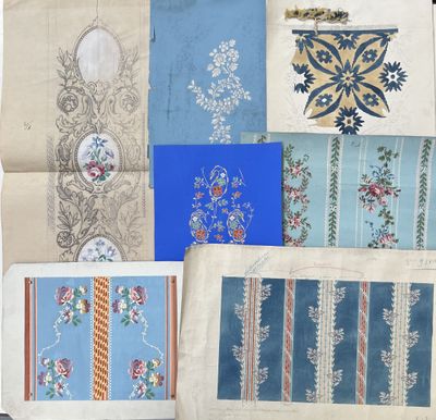 many different types of embroidered fabric on a table