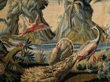 a lot of birds that are sitting on a tapestry