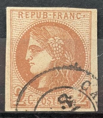 un timbre sur lequel figure l'image d'une femme