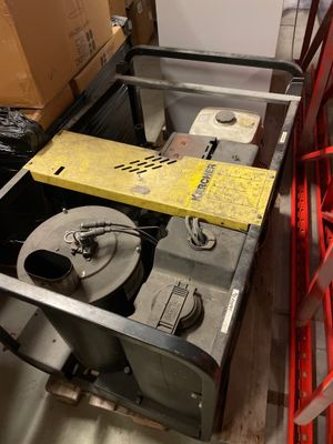a metal cart with a box on top of it
