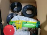 a cardboard box with various items inside of it