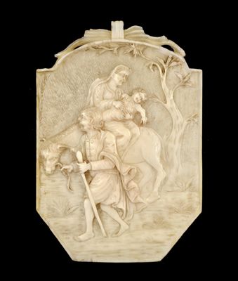 an image of a carved plaque depicting a man and a woman on horseback
