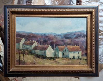 a picture of a painting on a chair in a room