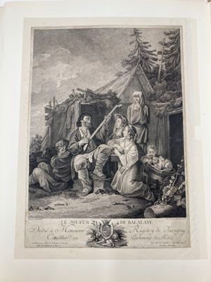 un vieux livre sur lequel figure le dessin d'un homme et d'une femme devant une tente