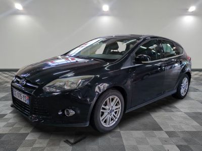a picture of a black car in a showroom