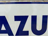 a sign that says azzu on it in blue and white