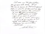 a black and white photo of a handwritten letter on a piece of paper