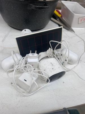 a lot of wires and a solar panel on the table