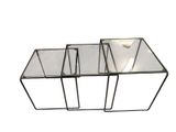 three glass nesting tables on a white background with a white background