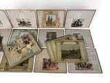 a lot of books with pictures on them on a table