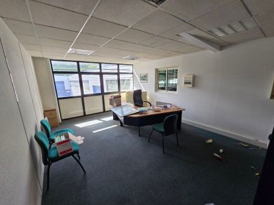 a room with a desk and a chair in it