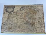an old map of the country of england with a ruler