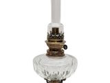 an image of a glass candle holder with a candle on top of it