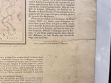 an old book with a map of europe on it