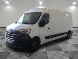 la photo d'une camionnette blanche garée dans un garage