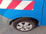 a blue van with a red and white stripe on the side