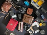 many different types of cameras on the table