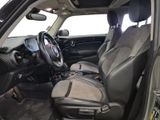 the interior of a car with a steering wheel and a dashboard