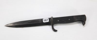 a knife that is laying on a white surface