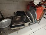 many pots and pans that are sitting on the counter