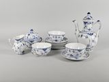an image of a blue and white tea set with cups, saucers, and a teapot