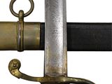 a sword that is on display on a white background