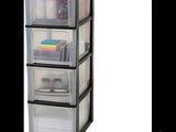 a close up of three plastic drawers on a white background