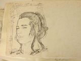 a drawing of a woman ' s face on a piece of paper