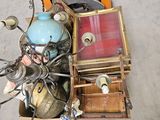 a pile of assorted items sitting on the floor