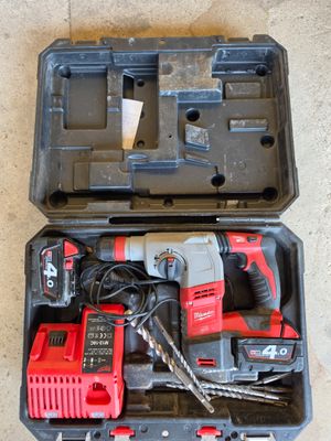 a tool in a case that is sitting on the floor