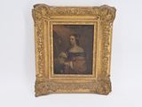 a painting of a woman in a gold frame on the wall