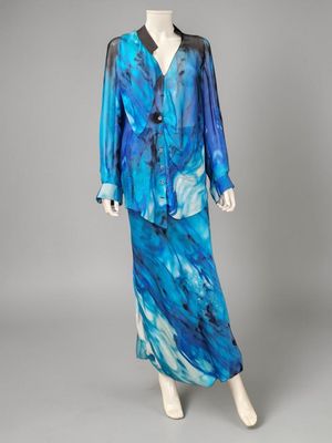 a blue and black dress and jacket on a mannequin mannequin mannequin mannequin mannequin mannequin mannequin manne