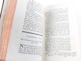 an open book that is sitting on a table