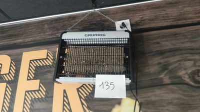 a bird cage hanging from the ceiling with a price tag on it